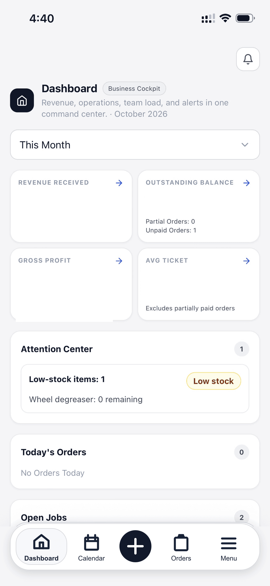 Auto Detailing CRM dashboard showing revenue, outstanding balance, gross profit, average ticket, and a low-stock alert