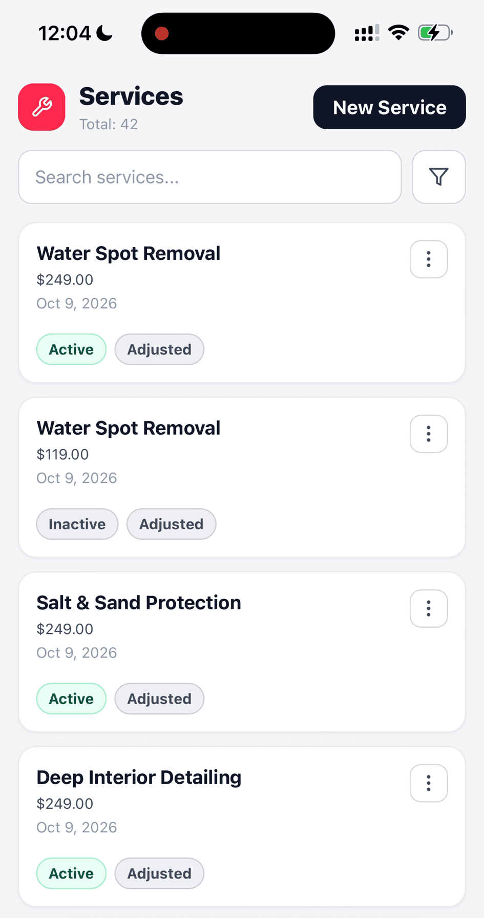 Detailing service catalog showing search, starting prices, active and inactive status, and body-type pricing labels