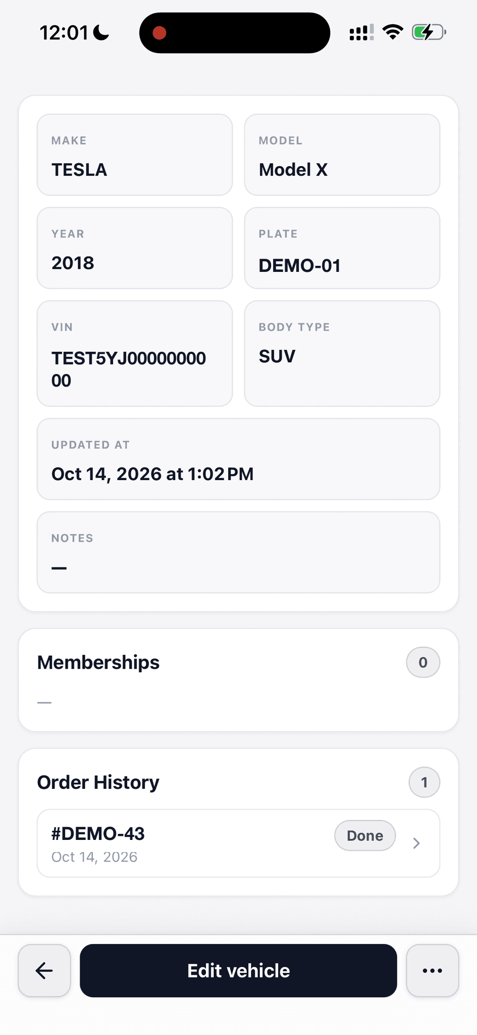 Vehicle record with a demonstration plate and test VIN, memberships, and a sample completed order